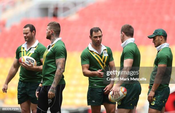 Kangaroos captain Cameron Smith talks to team mates during an Australian Kangaroos training session at Suncorp Stadium on December 1, 2017 in...