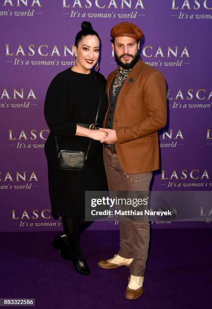 Manuel Cortez and Miyabi Kawai attend the opening of the 'Sound of Passion' exhibition for dessous brand LASCANA at Hotel de Rome on November 30,...