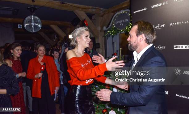 Steven Gaetjen and Lena Gercke attend the Christmas Dinner Party of Lena Gercke at the Bar Hygge on November 30, 2017 in Hamburg, Germany.