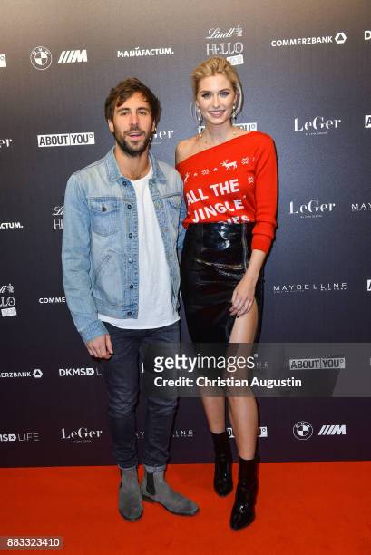 Max Giesinger and Lena Gercke attend the Christmas Dinner Party of Lena Gercke at the Bar Hygge on November 30, 2017 in Hamburg, Germany.