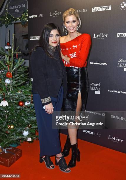 Lena Gercke and her sister Yana attend the Christmas Dinner Party of Lena Gercke at the Bar Hygge on November 30, 2017 in Hamburg, Germany.
