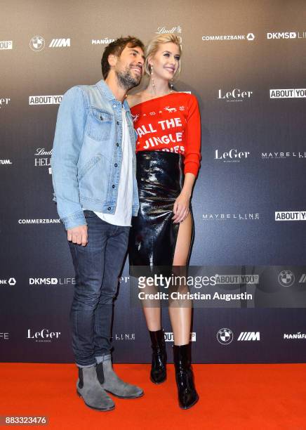 Max Giesinger and Lena Gercke attend the Christmas Dinner Party of Lena Gercke at the Bar Hygge on November 30, 2017 in Hamburg, Germany.