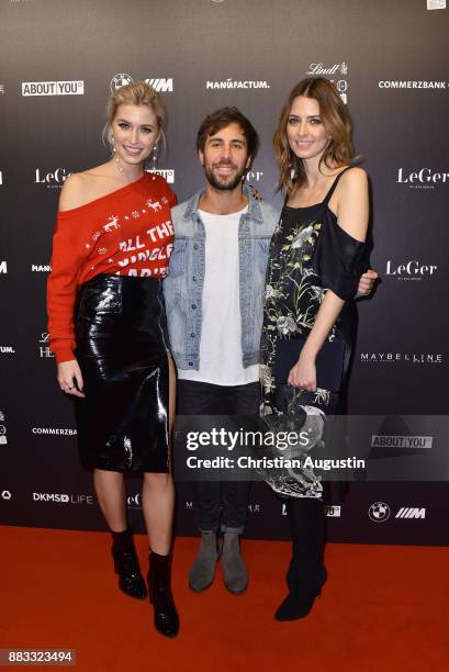 Lena Gercke, Max Giesinger and Eva Padberg attend the Christmas Dinner Party of Lena Gercke at the Bar Hygge on November 30, 2017 in Hamburg, Germany.