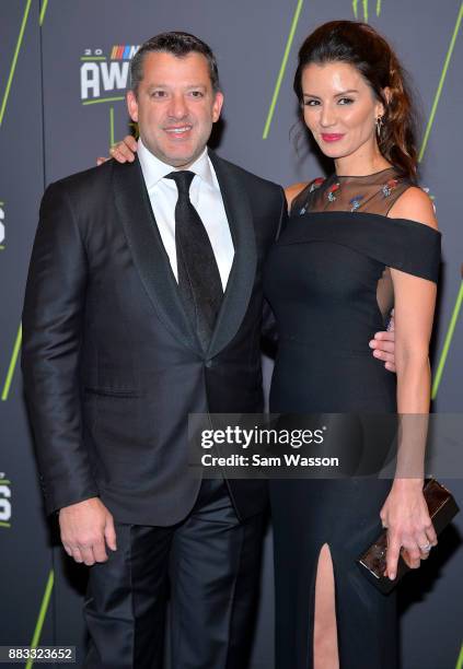 Former NASCAR driver Tony Stewart and his fiance Pennelope Jimenez attend the Monster Energy NASCAR Cup Series awards at Wynn Las Vegas on November...