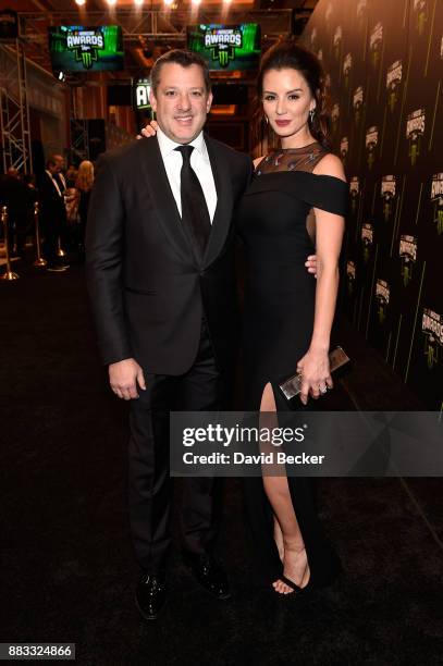 Former NASCAR driver Tony Stewart and his fiance Pennelope Jimenez attend the Monster Energy NASCAR Cup Series awards at Wynn Las Vegas on November...