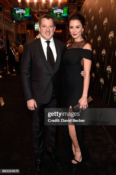 Former NASCAR driver Tony Stewart and his fiance Pennelope Jimenez attend the Monster Energy NASCAR Cup Series awards at Wynn Las Vegas on November...