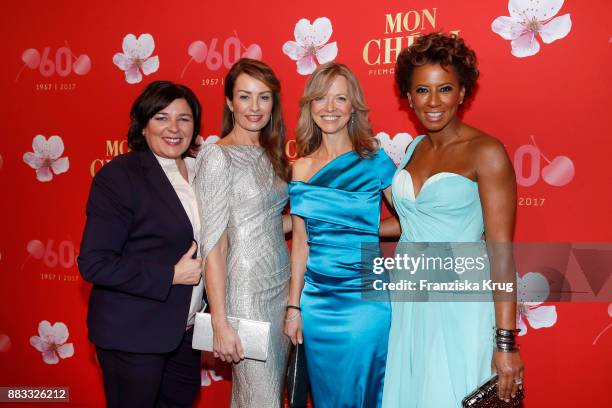 Vera Int-Veen, Sabrina Staubitz, Nicole Noevers and Arabella Kiesbauer attend the Mon Cheri Barbara Tag 2017 at Postpalast on November 30, 2017 in...