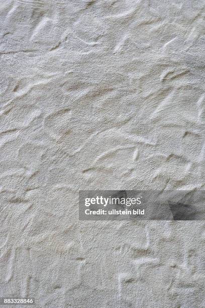 Weißer Hintergrund einer verputzten Mauer