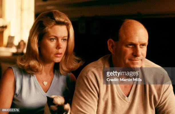 Actress Elizabeth Montgomery and her husband producer and director William Asher pose for a portrait at home circa 1966 in Beverly Hills, California.