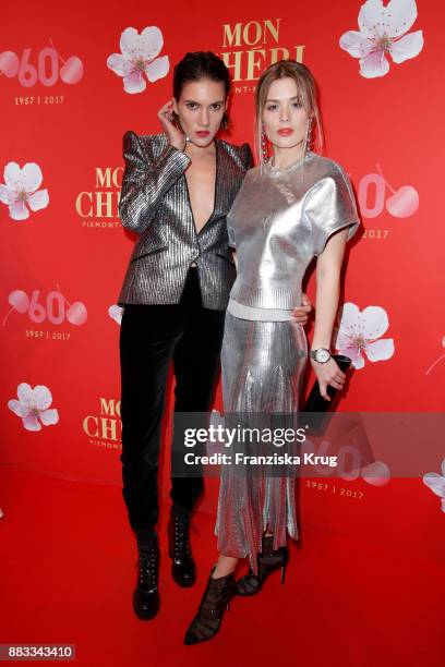 Tamy Glauser and Dominique Rinderknecht attend the Mon Cheri Barbara Tag 2017 at Postpalast on November 30, 2017 in Munich, Germany.