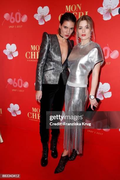 Tamy Glauser and Dominique Rinderknecht attend the Mon Cheri Barbara Tag 2017 at Postpalast on November 30, 2017 in Munich, Germany.