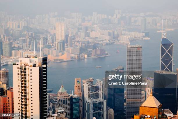 commercial and residential buildings in hong kong. - caroline pang stock pictures, royalty-free photos & images