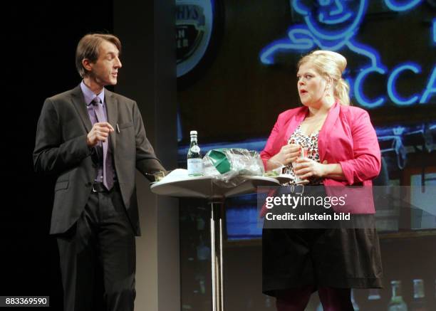 Actor Andreas Schmidt and Marie Schoeneburg in the play "Fettes Schwein", theater Komoedie am Kudamm in Berlin