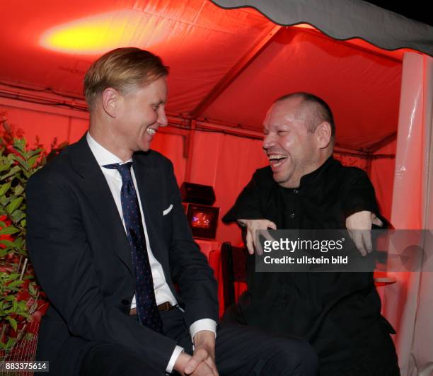 German singers Max Raabe and Thomas Quasthoff during the anniversary party "20 years 'Bar jeder Vernunft', 10 years 'Tipi'" at the 'Tipi' in Berlin