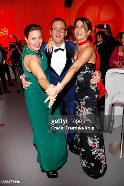 Julia Dahmen, Gerit Kling and her husband Wolfram Becker attend the Mon Cheri Barbara Tag 2017 at Postpalast on November 30, 2017 in Munich, Germany.