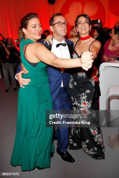 Julia Dahmen, Gerit Kling and her husband Wolfram Becker attend the Mon Cheri Barbara Tag 2017 at Postpalast on November 30, 2017 in Munich, Germany.