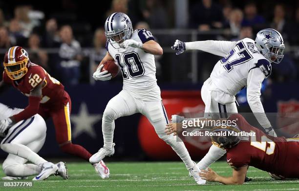 Ryan Switzer of the Dallas Cowboys runs past Tress Way of the Washington Redskins for a 83-yard touchdown punt return against the Washington Redskins...
