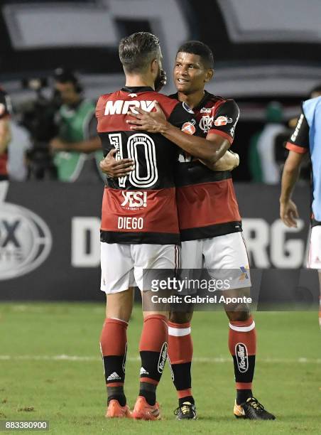 Diego and Marcio Araujo of Flamengo celebrate after winning a second leg match between Junior and Flamengo as part of the Copa CONMEBOL Sudamericana...
