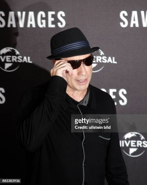 Schauspieler John Travolta aufgenommen bei einem Pressetermin zum Film "Savages" im Hotel-Adlon in Berlin