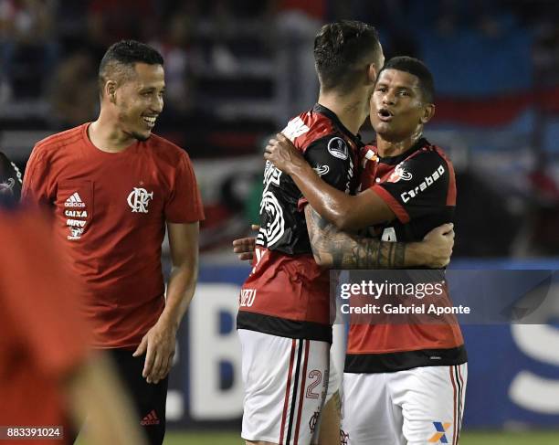 Felipe Vizeu and Marcio Araujo of Flamengo celebrate after winning a second leg match between Junior and Flamengo as part of the Copa CONMEBOL...