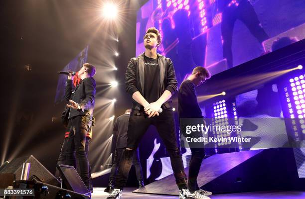 Daniel Seavey, Jonah Marais, and Zach Herron of Why Don't We perform onstage at WiLD 94.9's FM's Jingle Ball 2017 Presented by Capital One at SAP...