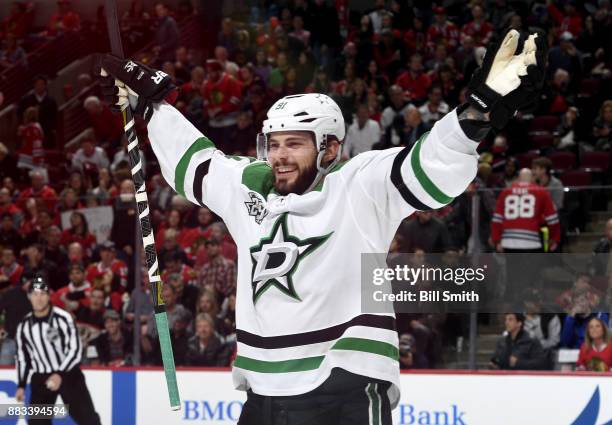 Tyler Seguin of the Dallas Stars celebrates after the Stars defeated the Chicago Blackhawks 4-3 in overtime at the United Center on November 30, 2017...