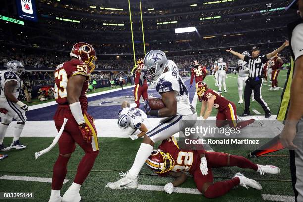 Rod Smith of the Dallas Cowboys runs the ball out of bounds against the Washington Redskins in the fourth quarter at AT&T Stadium on November 30,...
