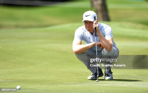 Alexander Knappe of Germany lines up a putt on the 17th hole during day two of the Australian PGA Championship at Royal Pines Resort on December 1,...