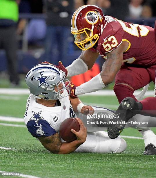 Dallas Cowboys quarterback Dak Prescott scrambles for 4 yards before giving himself up to Washington Redskins linebacker Zach Brown at the end of the...
