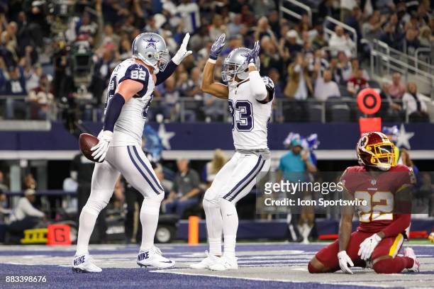 Dallas Cowboys tight end Jason Witten celebrates his touchdown with wide receiver Terrance Williams during the Thursday Night Football game between...
