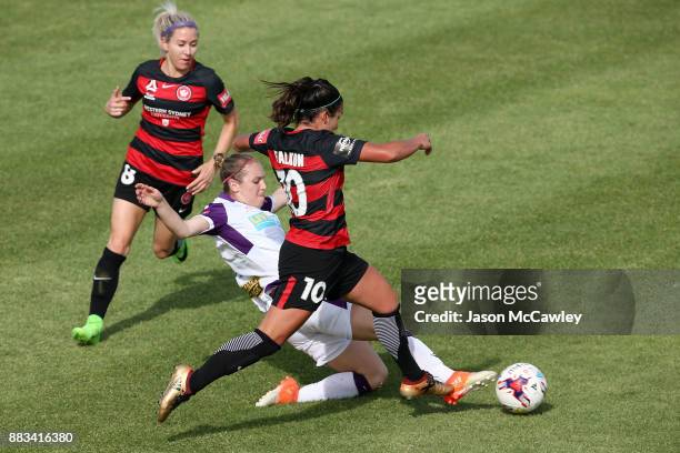 Lee Falkon of the Wanderers is challenged by Marianna Tabain of the Glory during the round six W-League match between the Western Sydney Wanderers...