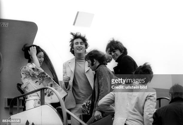 Beatles leaving Hamburg, on the gangway of a Japan Airlines aircrat at Hamburg airport, from left: John Lennon, Ringo Starr, George Harrison, Paul...