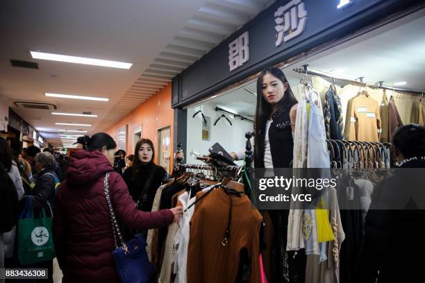 Vendor sells merchandise at the Dongding wholesale market before its closing on November 30, 2017 in Beijing, China. The Dongding market, the last of...