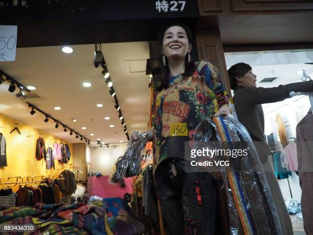 Vendor sells merchandise at the Dongding wholesale market before its closing on November 30, 2017 in Beijing, China. The Dongding market, the last of...