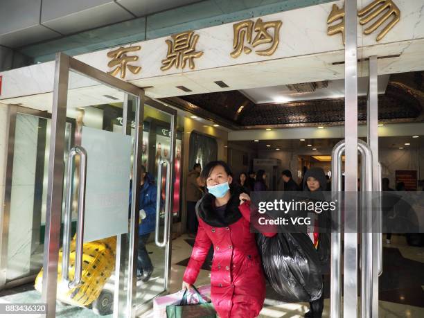 Vendor leaves Dongding wholesale market before its closing on November 30, 2017 in Beijing, China. The Dongding market, the last of 12 clothing...