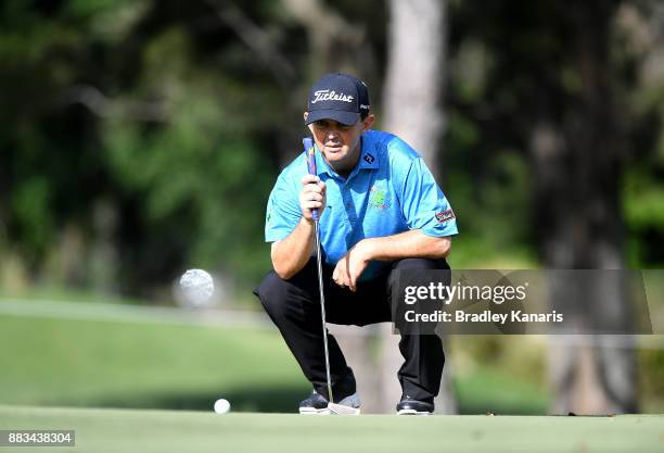 Greg Chalmers of Australia lines up a putt on the 17th hole during day two of the Australian PGA Championship at Royal Pines Resort on December 1,...