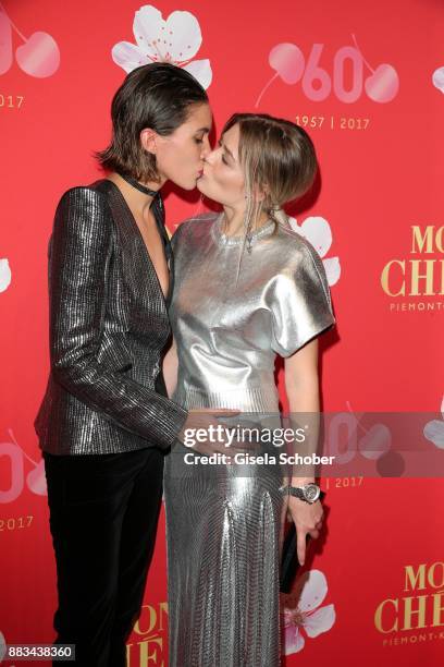 Tamy Glauser kiss her girlfriend Dominique Rinderknecht , "Tamynique" during the Mon Cheri Barbara Tag at Postpalast on November 30, 2017 in Munich,...