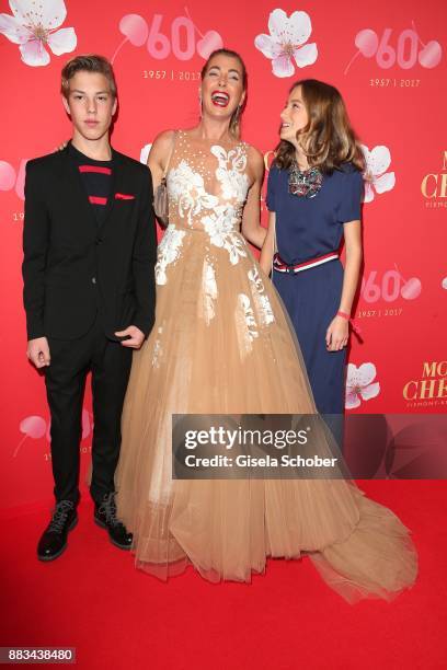 Giulia Siegel and her son Nathan and daughter Mia during the Mon Cheri Barbara Tag at Postpalast on November 30, 2017 in Munich, Germany.