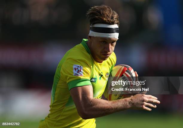 Lewis Holland of Australia in action during the match between on Day Two of the Emirates Dubai Rugby Sevens - HSBC Sevens World Series at The Sevens...