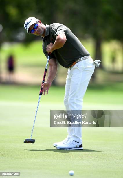 Adam Scott of Australia putts on the 8th hole during day two of the Australian PGA Championship at Royal Pines Resort on December 1, 2017 in Gold...