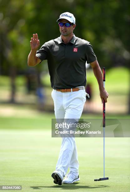 Adam Scott of Australia acknowledges the crowd after sinking a putt on the 8th hole during day two of the Australian PGA Championship at Royal Pines...