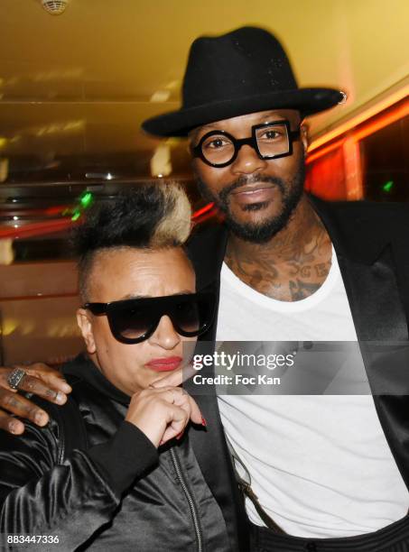 Fashion designer Nadia Toure and footballer Djibril Cisse attend 'Les Diamants de L'Orient' Nadia Toure Streetwear Fashion Show at VIP Room Theater...