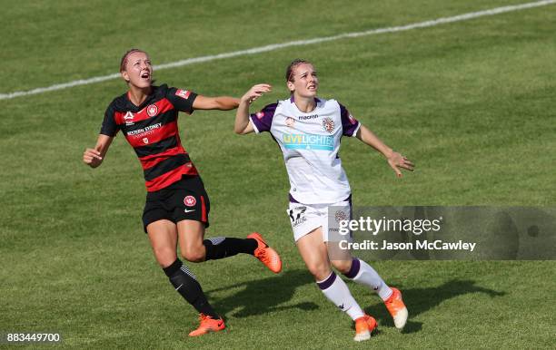 Maruschka Waldus of the Wanderers and Marianna Tabain of the Glory compete for the ball during the round six W-League match between the Western...