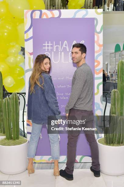 Laura Perlongo and Nev Schulman attend Barneys New York Celebrates Haas for the Holidays Hosted by Matthew Mazzucca, Nikolai Haas and Simon Haas at...