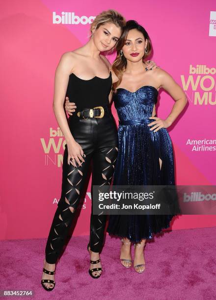 Singer Selena Gomez and actress Francia Raisa attend Billboard Women In Music 2017 at The Ray Dolby Ballroom at Hollywood & Highland Center on...