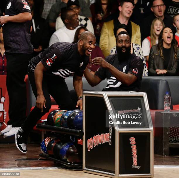 Chris Paul, left, and James Harden attends the State Farm Chris Paul PBA Celebrity Invitational at the Bowlero Woodlands on November 30, 2017 in The...