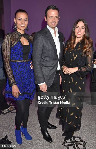 Francisca Urio, Till Broenner and Johanna Klum attend the exhibition opening 'Sound of Passion' at Hotel De Rome on November 30, 2017 in Berlin,...