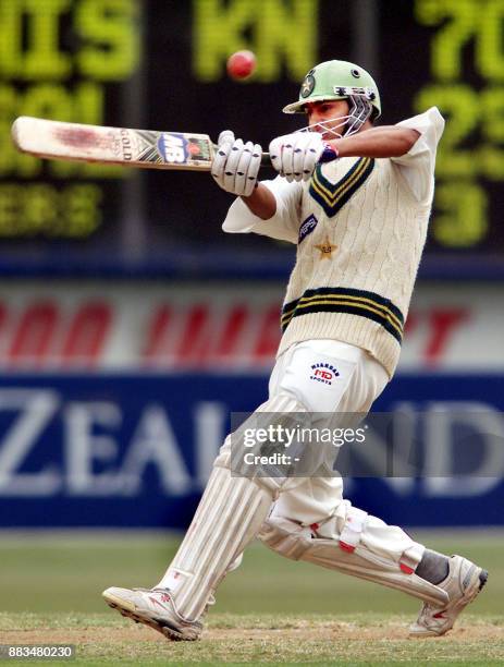 Pakistan batsman Faisal Iqbal hooks the ball away for a six from New Zealand bowler Craig McMillian on the first day of the first Test Match being...