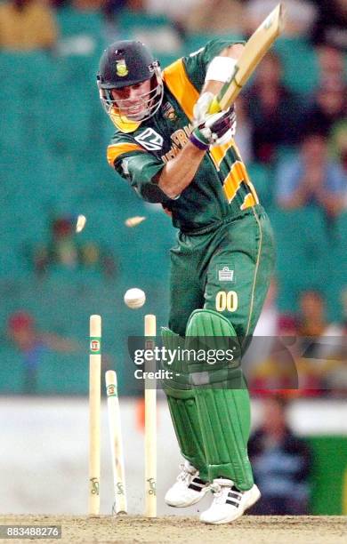 South African batsmen Herschelle Gibbs is bowled by New Zealand bowler Andre Adams as South Africa defeat New Zealand in the second one-day final...