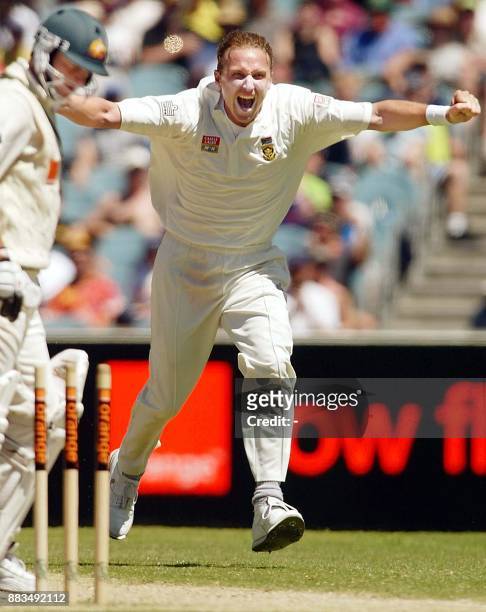 South African paceman Allan Donald celebrates after bowling Australian batsman Mark Waugh on the third day of the second Test Match being played at...